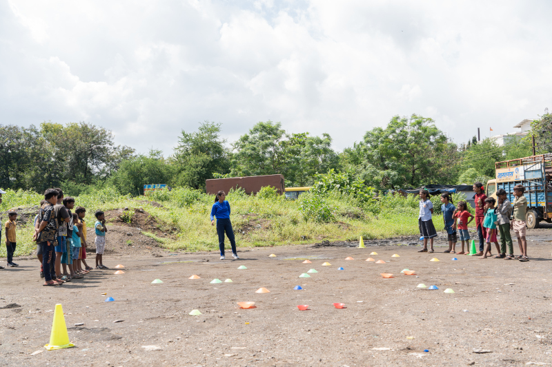 Sheetal,-Sports-Coach,-Educo-Prerana-Project-engaging-children-in-sports-calss-at-a-community-ground-available.jpg